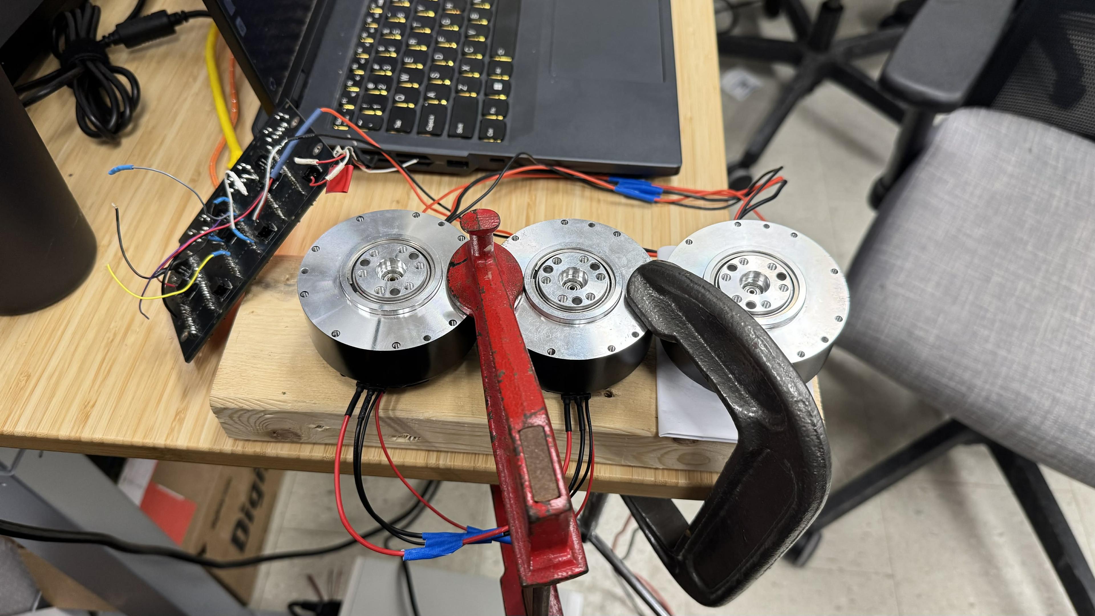 Teensy 4.1 with Robstride O2 motors on a bench