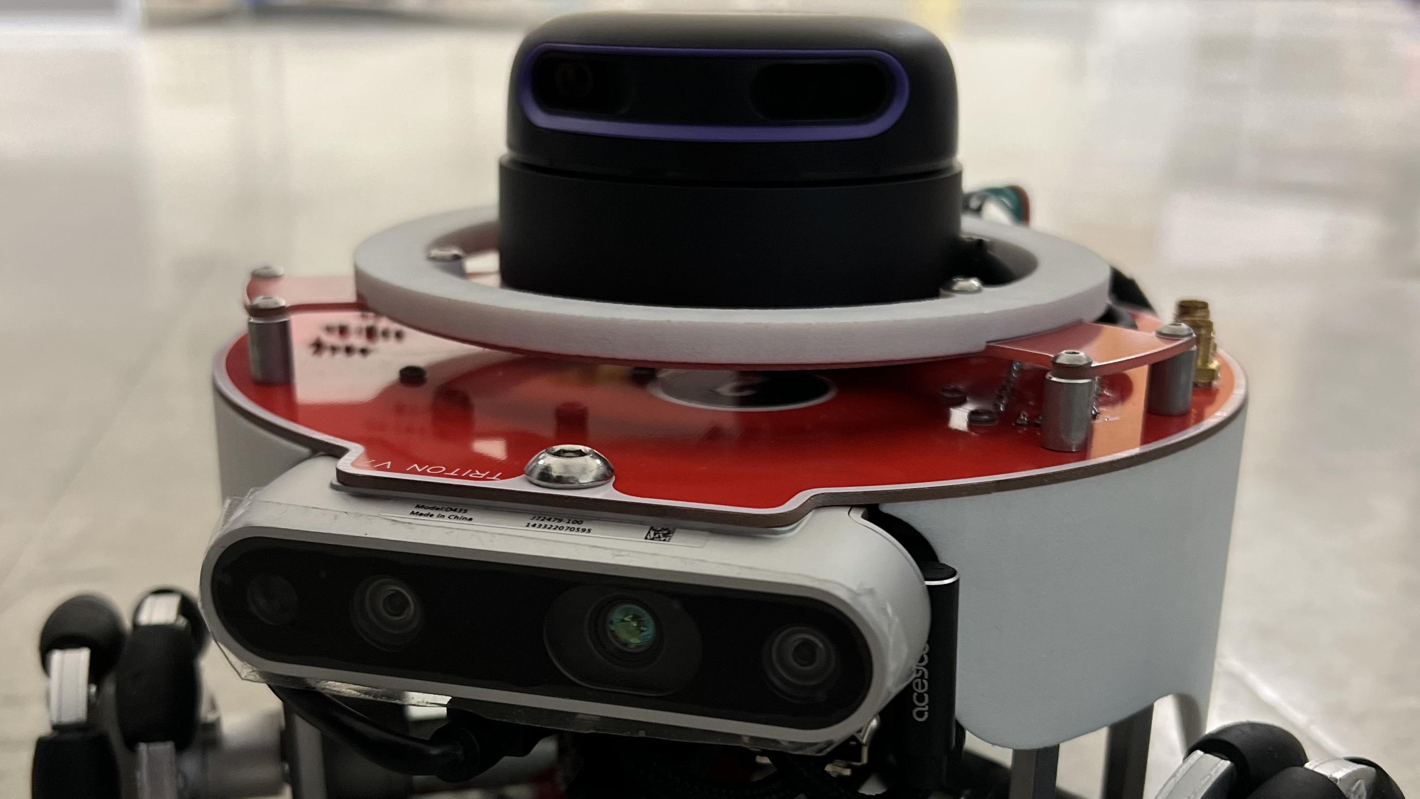 Triton mobile robot for human following